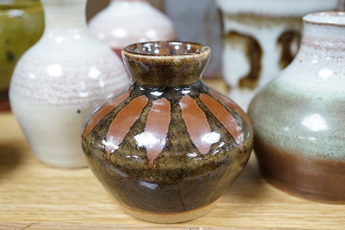 A collection of studio pottery to include a Celtic pottery Newlyn goblet, various jugs and bowls, largest 19cm high
